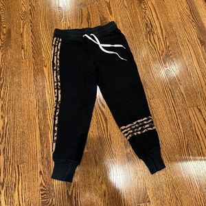 Black n:philanthropy sweat pants with leopard print detail. Size small